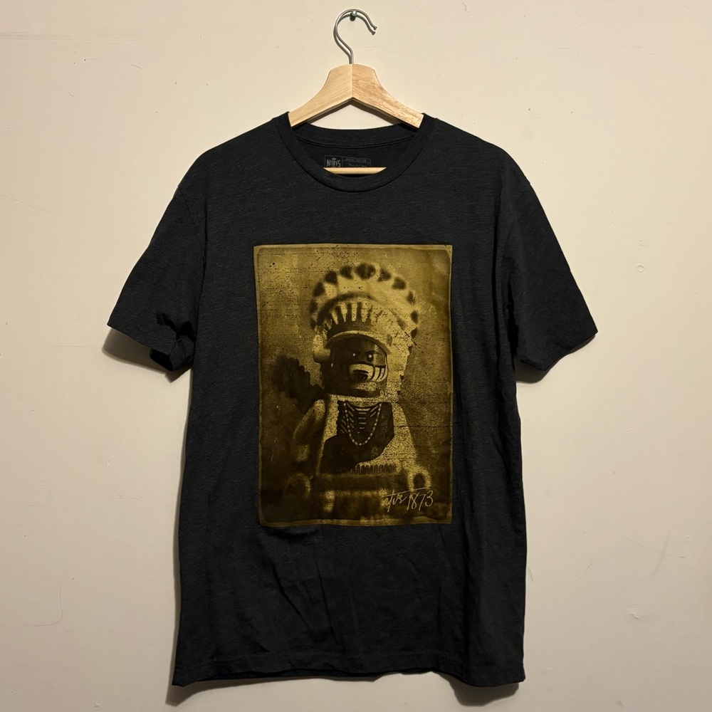THE NTVS ARTIST EDITION STEVEN PAUL JUDD LEGO NATIVE AMERICAN GRAPHIC T-SHIRT